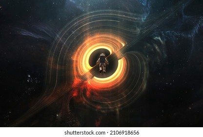 Astronaut looks at black hole and event horizon. 5K realistic science fiction art. Elements of image provided by Nasa - Shutterstock ID 2106918656