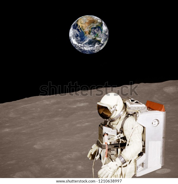 Astronaut on the alien planet. Stars\
above. The elements of this image furnished by\
NASA.\

