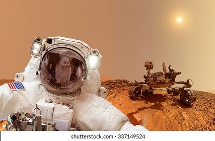 Astronaut On Mars In Background A Rover - Elements Of This Image Furnished By NASA