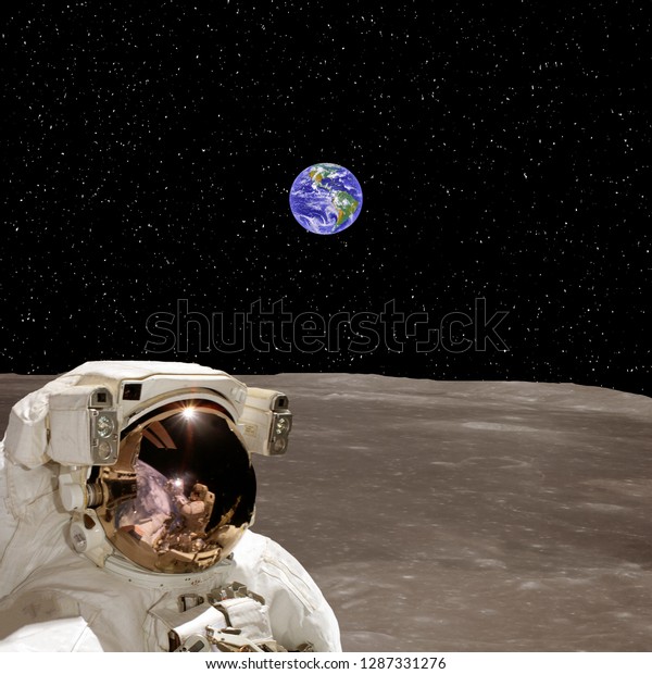 Astronaut on the moon and
earth planet on the background. The elements of this image
furnished by NASA.
