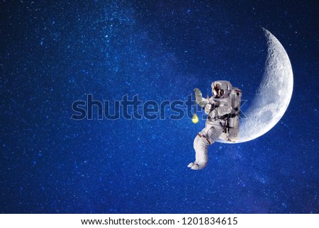 the astronaut on moon.space moon lighting.elements of this image furnished by NASA