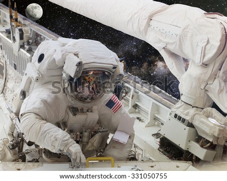 Astronaut on space mission. Elements of this image furnished by NASA.
