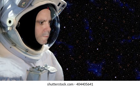 Astronaut on space mission with stars on the background. Cosmonaut in a spacesuit explores the cosmos. Space exploration. - Powered by Shutterstock