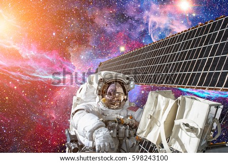 Astronaut in outer space. Spacewalk. Elements of this image furnished by NASA.