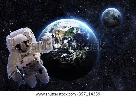 Astronaut Over Earth - Elements of this Image Furnished by NASA