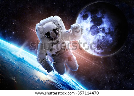 Astronaut Over Earth - Elements of this Image Furnished by NASA