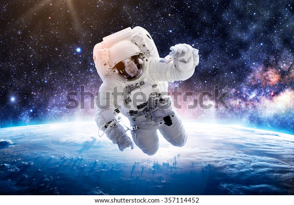 Astronaut Over Earth Elements This Image Stock Photo (Edit Now) 357114452