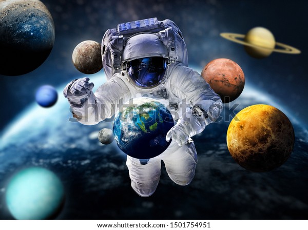 Astronaut with\
planets of Solar System. Earth, Mars, Jupiter. Background for\
infographics. Planet on the background. ABstract wallpaper.\
Elements of this image furnished by\
NASA