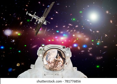 Astronaut posing. The elements of this image furnished by NASA.