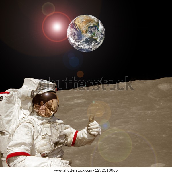Astronaut posing on the moon. The elements of\
this image furnished by\
NASA.\
