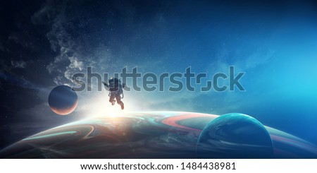 Astronaut in space costume in outer space. Spacewalk