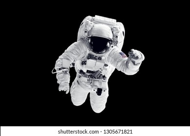 Astronaut in space suit over black background. Elements of this image furnished by NASA - Powered by Shutterstock