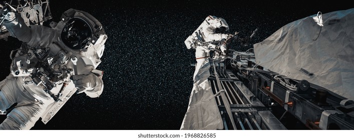 Astronaut spaceman do spacewalk while working for space station in outer space . Astronaut wear full spacesuit for space operation . Elements of this image furnished by NASA space astronaut photos.