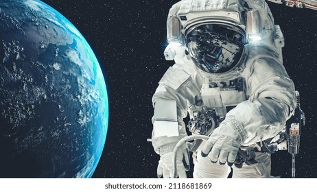 Astronaut spaceman do spacewalk while working for spaceflight mission at space station . Astronaut wear full spacesuit for operation . Elements of this image furnished by NASA space astronaut photos .
