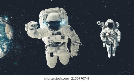 Astronaut spaceman do spacewalk while working for spaceflight mission at space station . Astronaut wear full spacesuit for operation . Elements of this image furnished by NASA space astronaut photos .