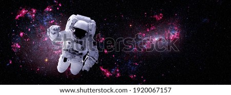 Astronaut spaceman do spacewalk while working for space station in outer space . Astronaut wear full spacesuit for space operation . Elements of this image furnished by NASA space astronaut photos.