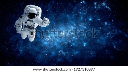 Astronaut spaceman do spacewalk while working for space station in outer space . Astronaut wear full spacesuit for space operation . Elements of this image furnished by NASA space astronaut photos.