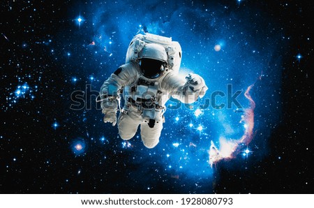 Astronaut spaceman do spacewalk while working for space station in outer space . Astronaut wear full spacesuit for space operation . Elements of this image furnished by NASA space astronaut photos.