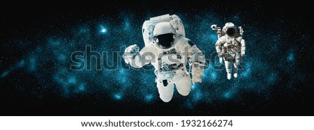 Astronaut spaceman do spacewalk while working for space station in outer space . Astronaut wear full spacesuit for space operation . Elements of this image furnished by NASA space astronaut photos.