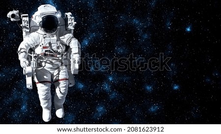 Astronaut spaceman do spacewalk while working for spaceflight mission at space station . Astronaut wear full spacesuit for operation . Elements of this image furnished by NASA space astronaut photos .