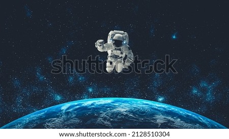 Astronaut spaceman do spacewalk while working for spaceflight mission at space station . Astronaut wear full spacesuit for operation . Elements of this image furnished by NASA space astronaut photos .