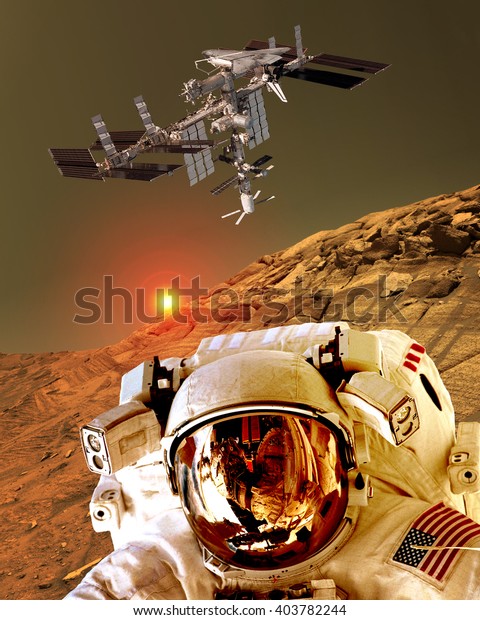 Astronaut\
spaceman helmet planet Mars surface martian colony space landscape.\
Elements of this image furnished by\
NASA.