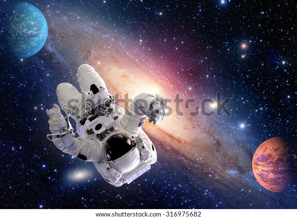 Astronaut\
spaceman outer space man relax people concept planet universe.\
Elements of this image furnished by\
NASA.