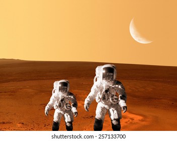 Astronaut spaceman planet Mars surface space people. Elements of this image furnished by NASA.