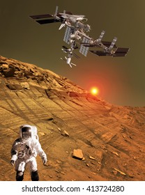 Astronaut spaceman planet Mars surface martian colony space landscape. Elements of this image furnished by NASA.
