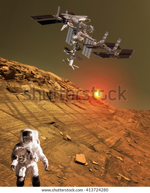 Astronaut\
spaceman planet Mars surface martian colony space landscape.\
Elements of this image furnished by\
NASA.