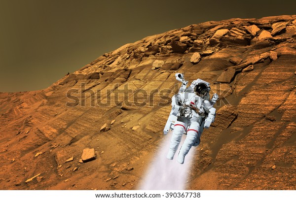 Astronaut\
spaceman suit planet Mars jet pack jetpack space landscape.\
Elements of this image furnished by\
NASA.
