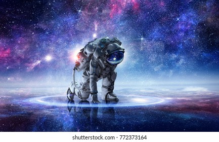 Astronaut starting to run. Mixed media - Shutterstock ID 772373164