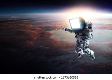 Astronaut with TV head in space. Mixed media.