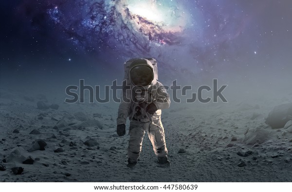 Astronaut walking on an unexplored planet. Elements\
furnished by NASA