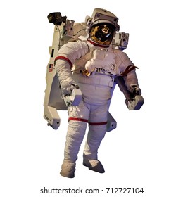An astronaut wearing a spacesuit on a spacewalk , includes clipping path