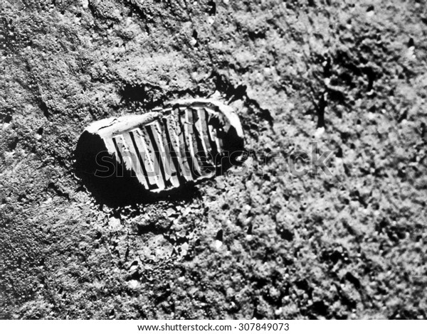 Astronaut\'s boot print on lunar (moon)\
landing mission. Elements of this image furnished by\
NASA.