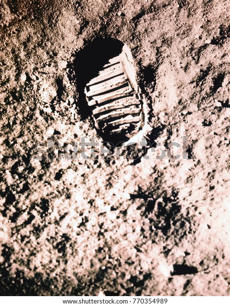 Astronaut\'s boot print on lunar (moon) landing\
mission. Digitally restored and cleaned. Elements of this image\
furnished by\
NASA.\
\
