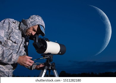 Astronomer Observes The Moon Through A Telescope. Amateur Astronomy And The Big Moon.