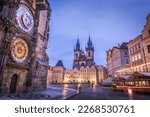 Astronomical clock, Tyn church and old town hall tower in Prague at dawn, Czech republic