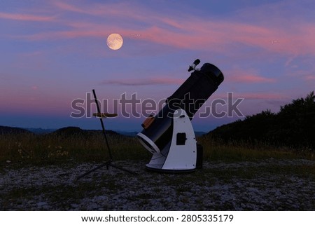Astronomy telescope for observing Lunar eclipse, stars, planets and other celestial Milky Way objects.