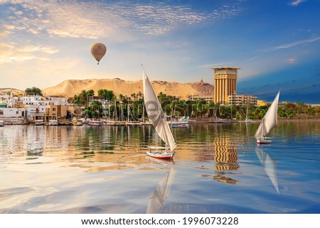 Aswan river scenery with air baloons, beautiful Nile view, Egypt
