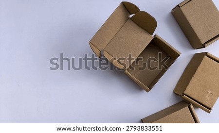 Asymmetric composition of cardboard packaging boxes for marketing.