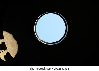 Asymmetrical hole through a ceiling