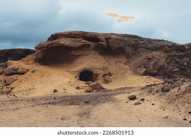 Atacama desert cave in the rocks cloudy dark day - Powered by Shutterstock