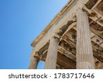 Athens Acropolis, Greece landmark. Temple of Athena, Erechtheum Ancient Greek ruins, blue sky in spring sunny day.