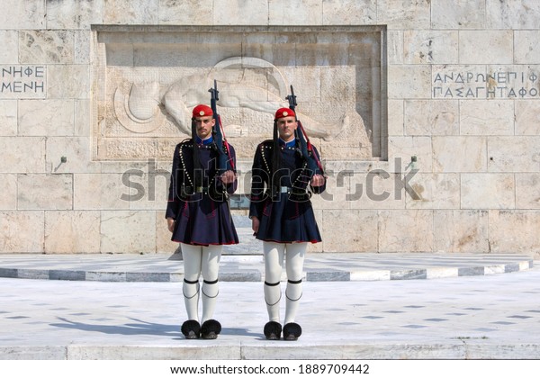 ATHENS, ATTICA ,GREECE - 3 of April 2019 :  Men from\
the presidential guard (Evzones) during the changing of the guards,\
in front of The Tomb of the Unknown soldier in Athens, Greece.\
Sunny day