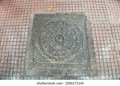 Athens, Attica, Greece - June 12 2022: The Oldest Modern Manhole Cover In This Town Dates Back To 1871!