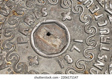 Athens, Attica, Greece - June 12 2022: The Oldest Modern Manhole Cover In This Town Dates Back To 1871!