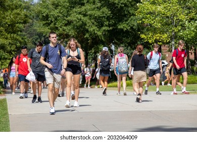 Athens, Georgia - August 27, 2021: Students Walking On Campus At The University Of Georgia. The University Was Recommending But Had Not Mandated The Wearing Of Masks Or Vaccinations Against COVID-19.