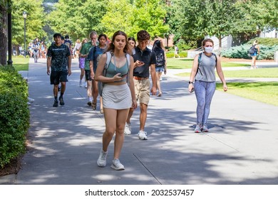 Athens, Georgia - August 27, 2021: Students Walking On Campus At The University Of Georgia. The University Recommended But Had Not Mandated Masks Or Vaccinations Against COVID-19.